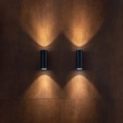 Ago applique wall | brown anodized aluminium