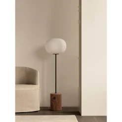 JWDA floor | Red travertine stone and bronzed brass